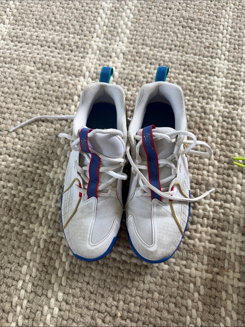 Nike Kids White Sneakers with Blue, Red and Gold Trim